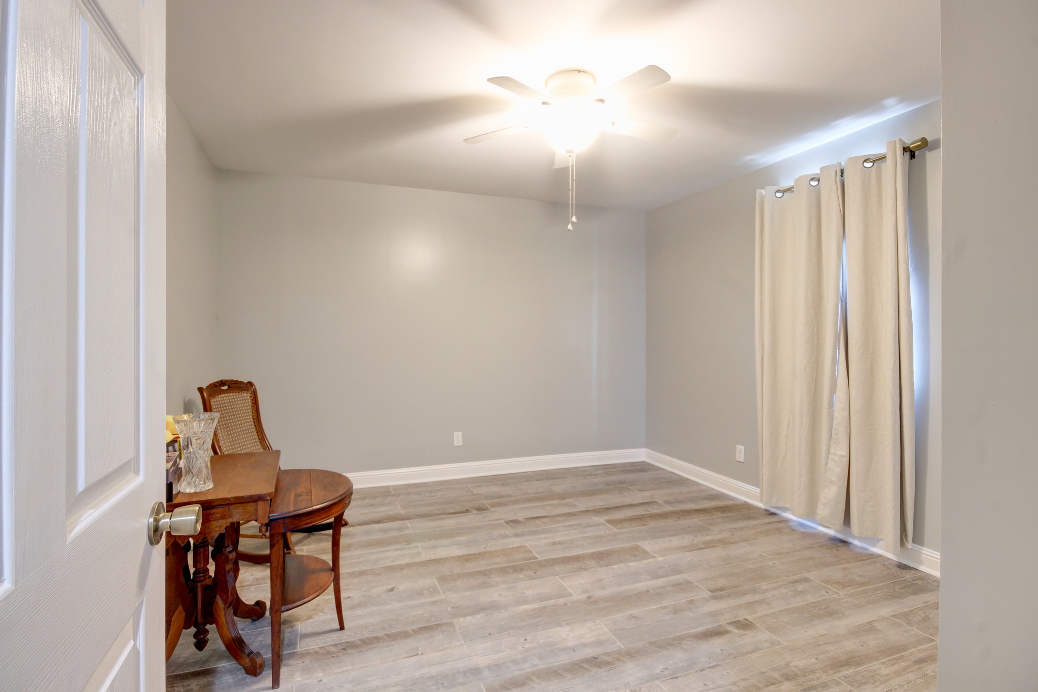4141 Sango Road Clarksville, TN 37043 - Photo 37 of 57 a room with a window and furniture
