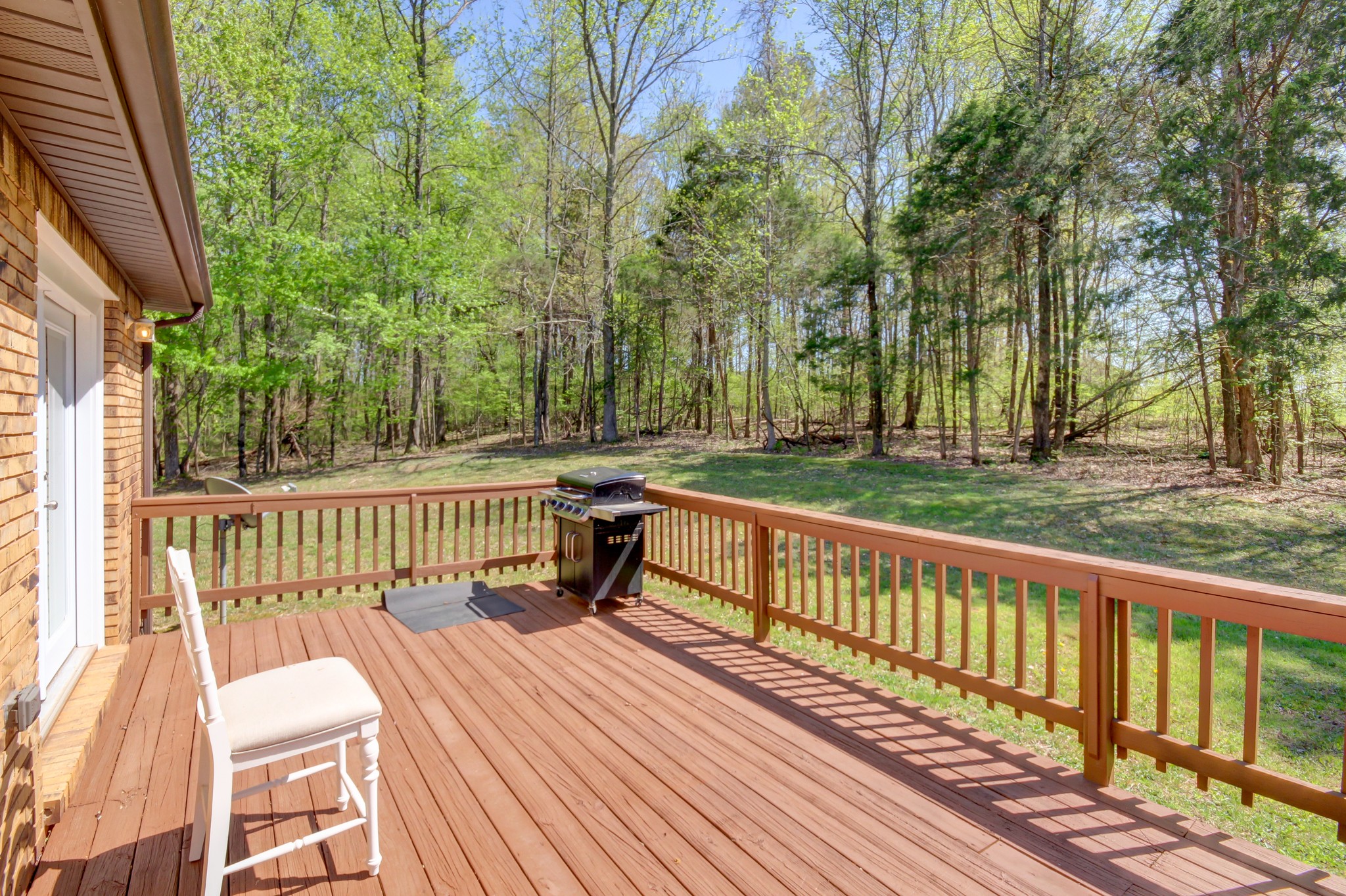 4141 Sango Road Clarksville, TN 37043 - Photo 45 of 57 a view of a wooden deck with a bench