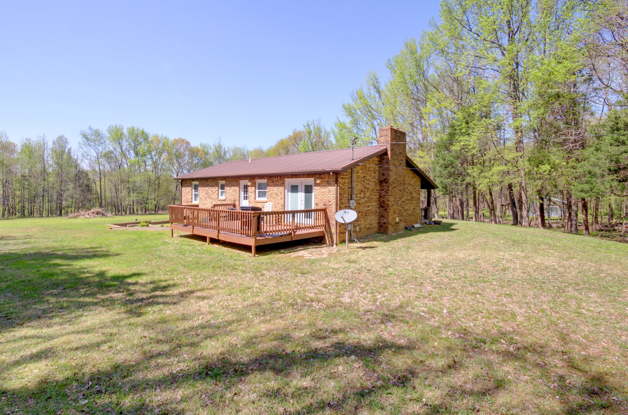 4141 Sango Road Clarksville, TN 37043 - Photo 48 of 57 a view of backyard with a garden and trees