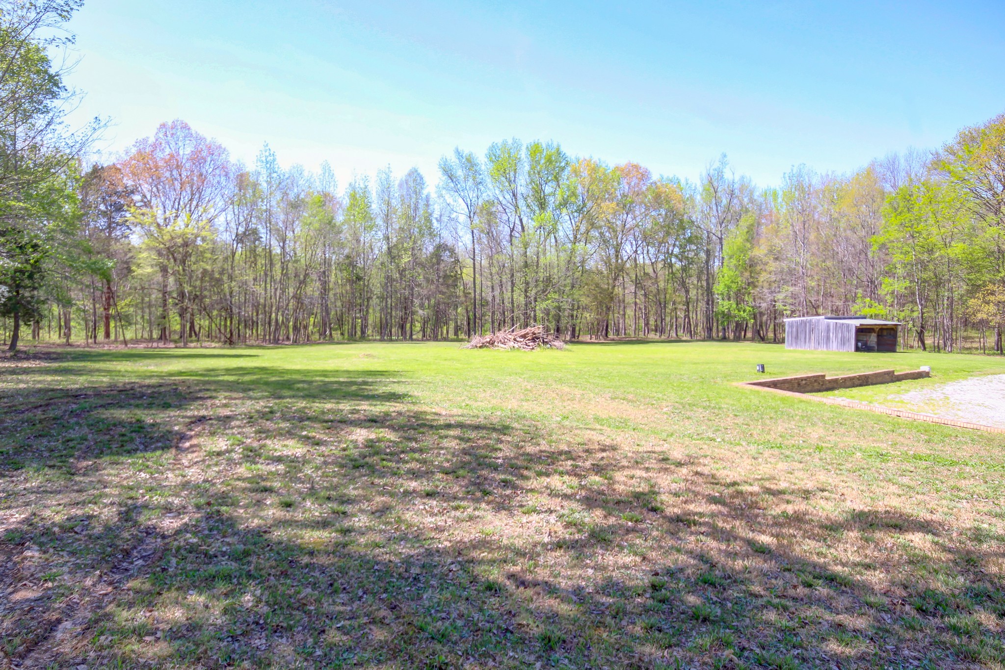 4141 Sango Road Clarksville, TN 37043 - Photo 49 of 57 a view of a golf course with a house in the background