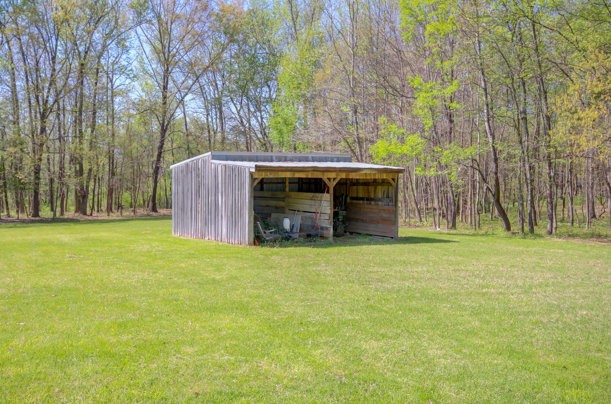4141 Sango Road Clarksville, TN 37043 - Photo 51 of 57 a backyard of a house with barbeque oven