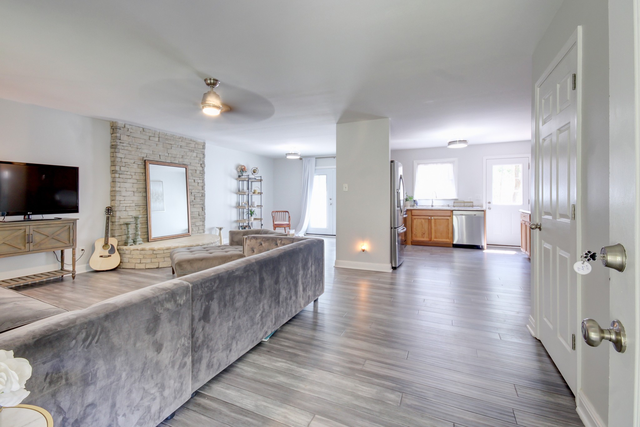 4141 Sango Road Clarksville, TN 37043 - Photo 6 of 57 a large bathroom with a large mirror and a sink