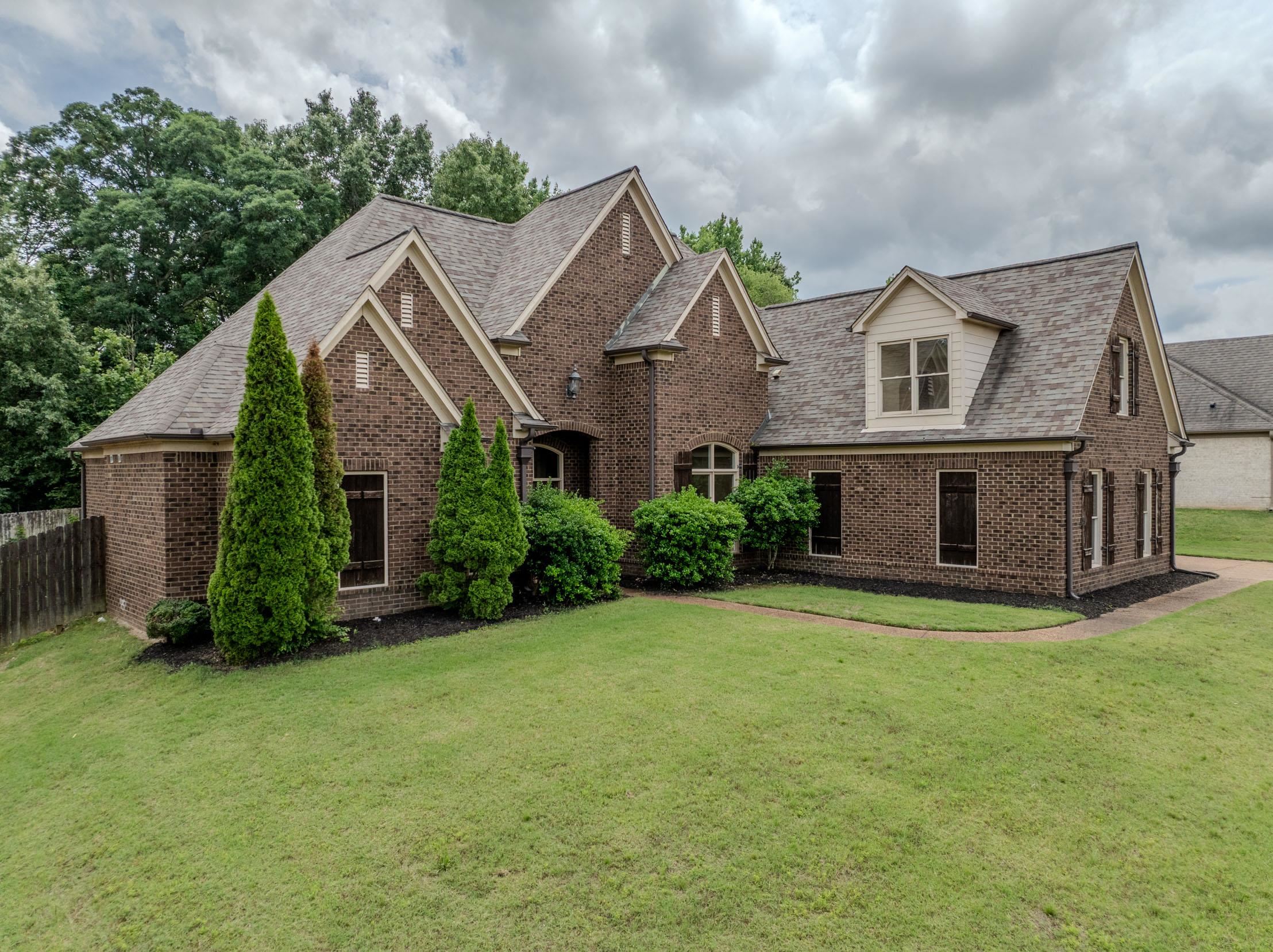 5380 Scarlet Ridge Drive Arlington, TN 38002 - Photo 1 of 35 Traditional brick exterior with gabled roof lines and dormer windows