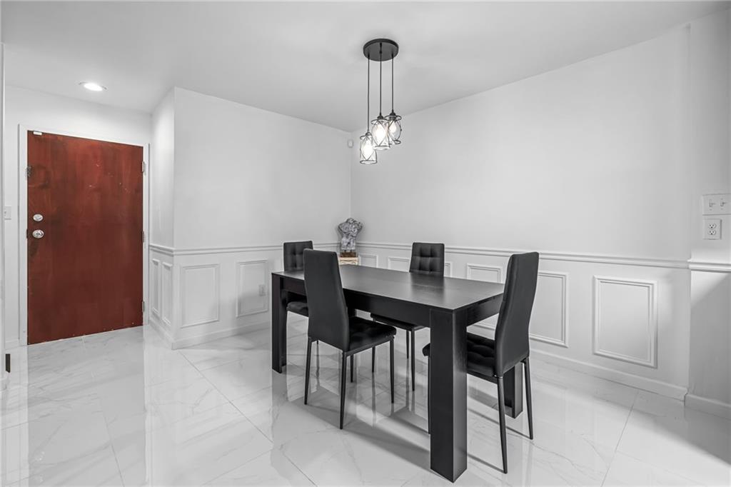 1509 Kenzie Road Pittsburgh, PA 15205 - Photo 6 of 25 a view of a dining room with a table and chairs