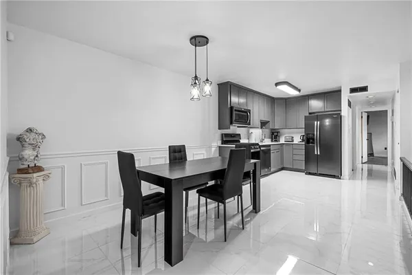 a view of a dining room with furniture