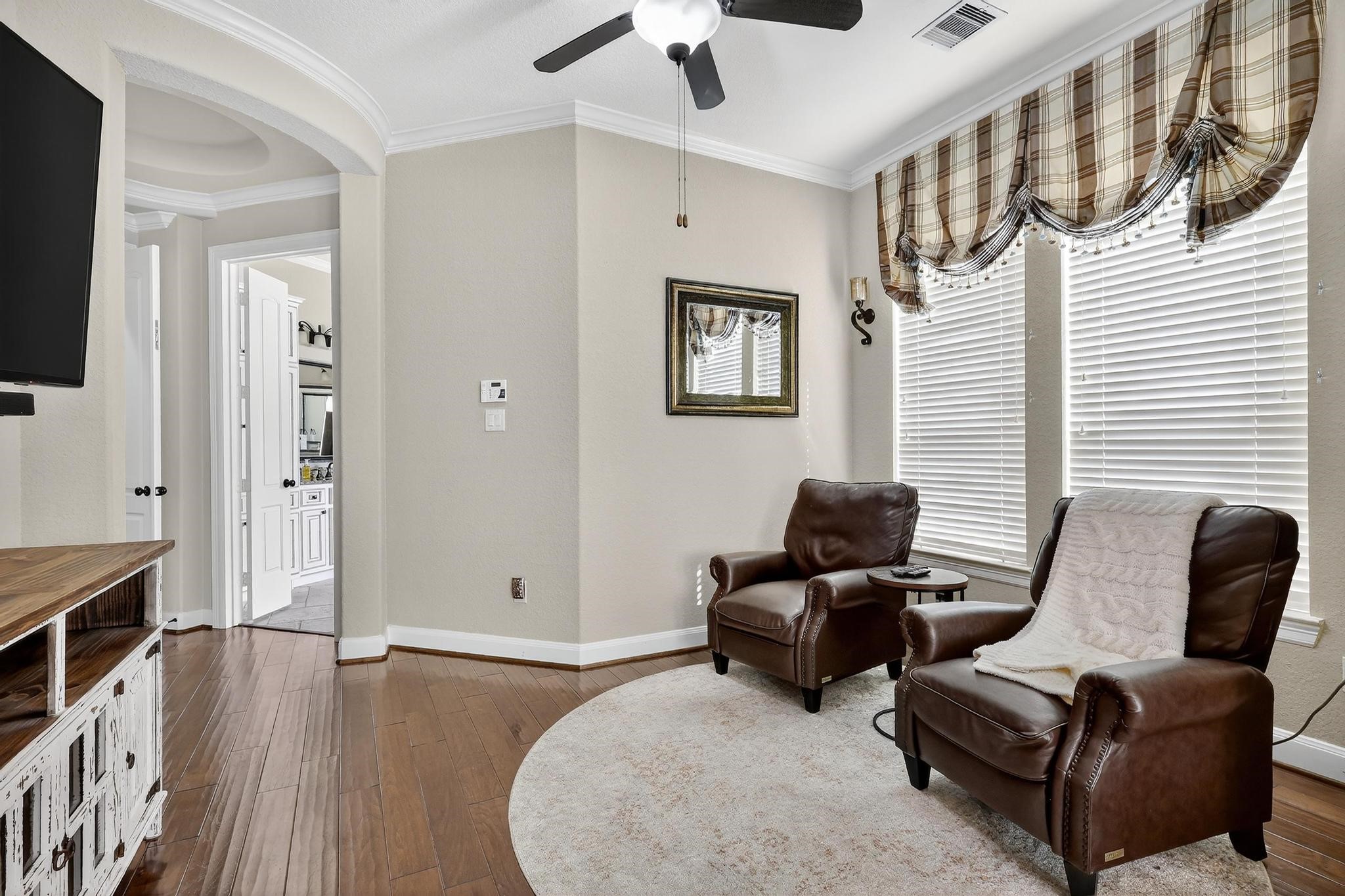 25803 Heritage Maple Drive Spring, TX 77389 - Photo 36 of 46 a living room with furniture and a flat screen tv