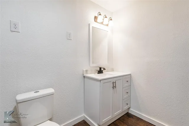 a bathroom with a sink and a toilet