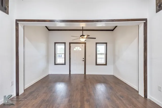 a view of livingroom with window and wooden floor