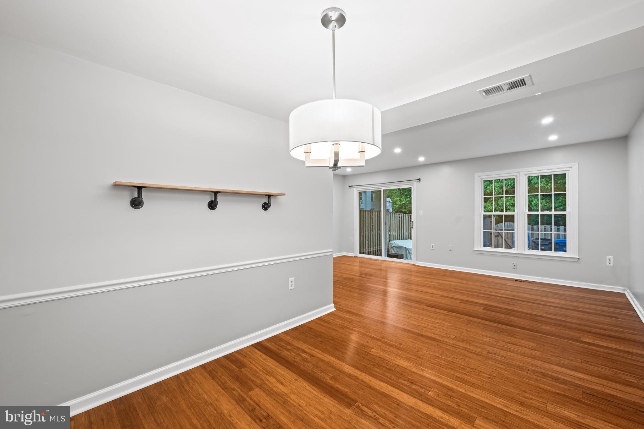 5725 Ridge View Drive Alexandria, VA 22310 - Photo 16 of 53 Dining room flowing into the living room