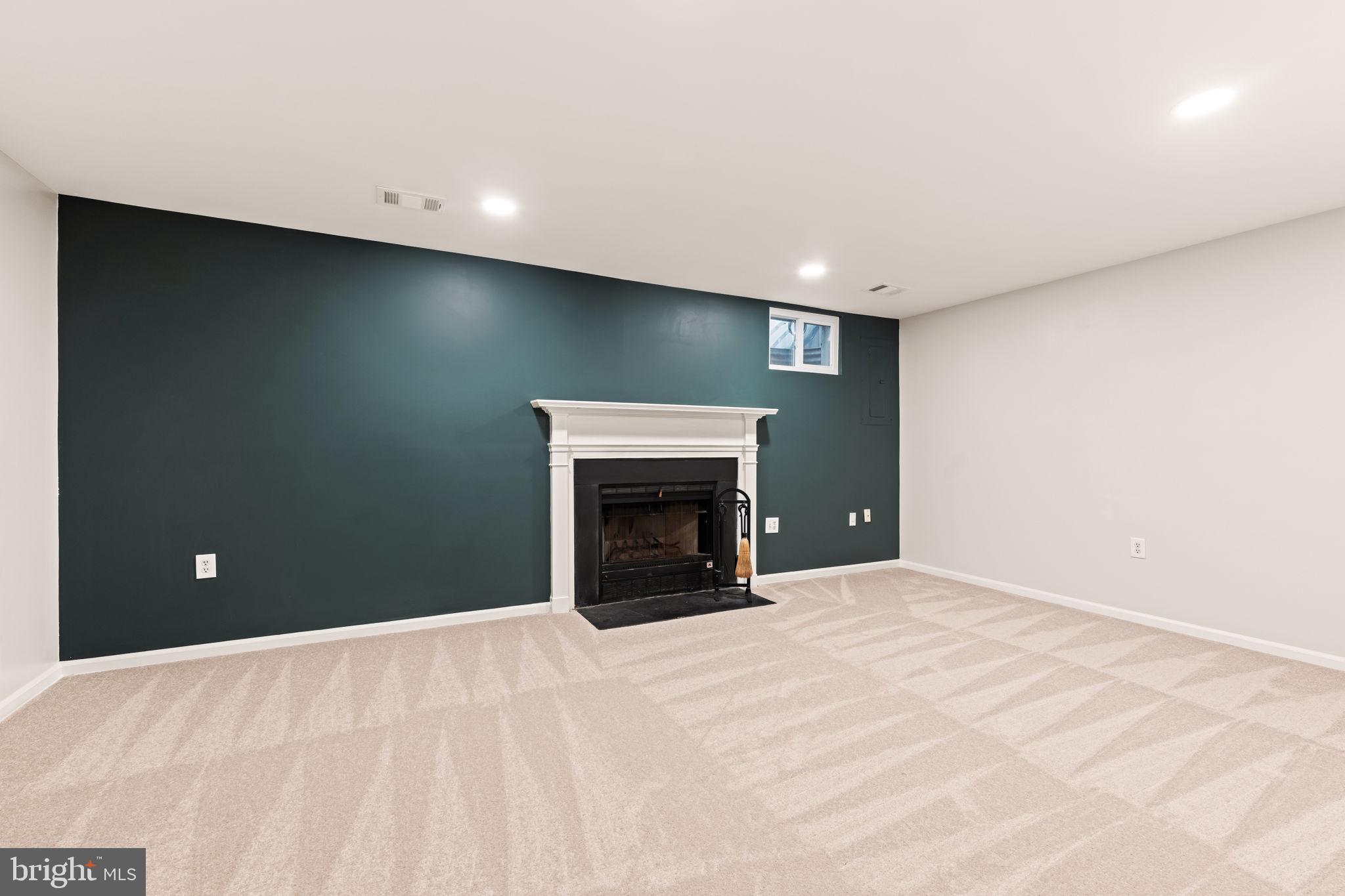 5725 Ridge View Drive Alexandria, VA 22310 - Photo 38 of 53 Family Room featuring a fireplace
