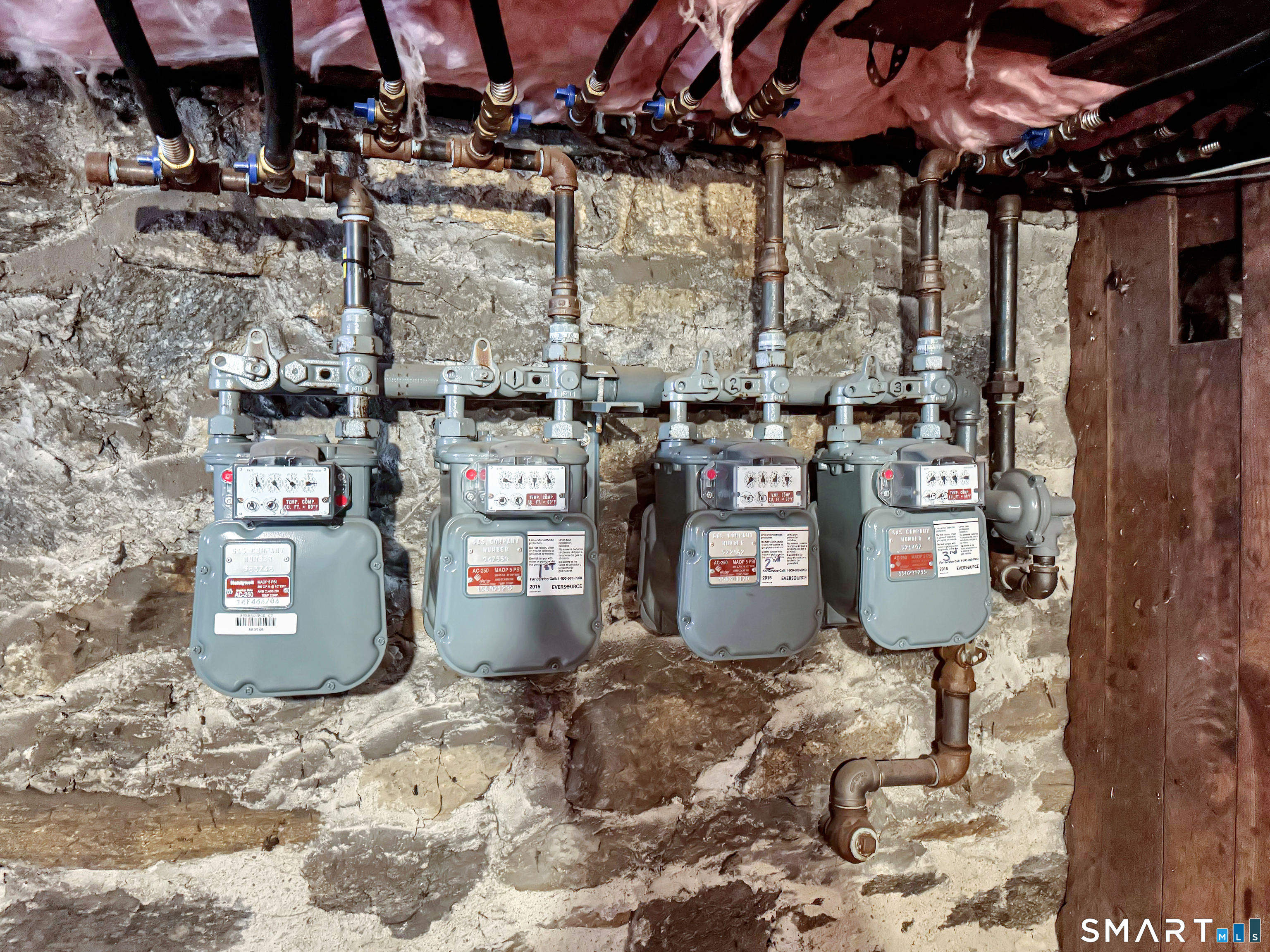 18 Columbia Street Ansonia, CT 06401 - Photo 13 of 16 a view of store room with two washing machine