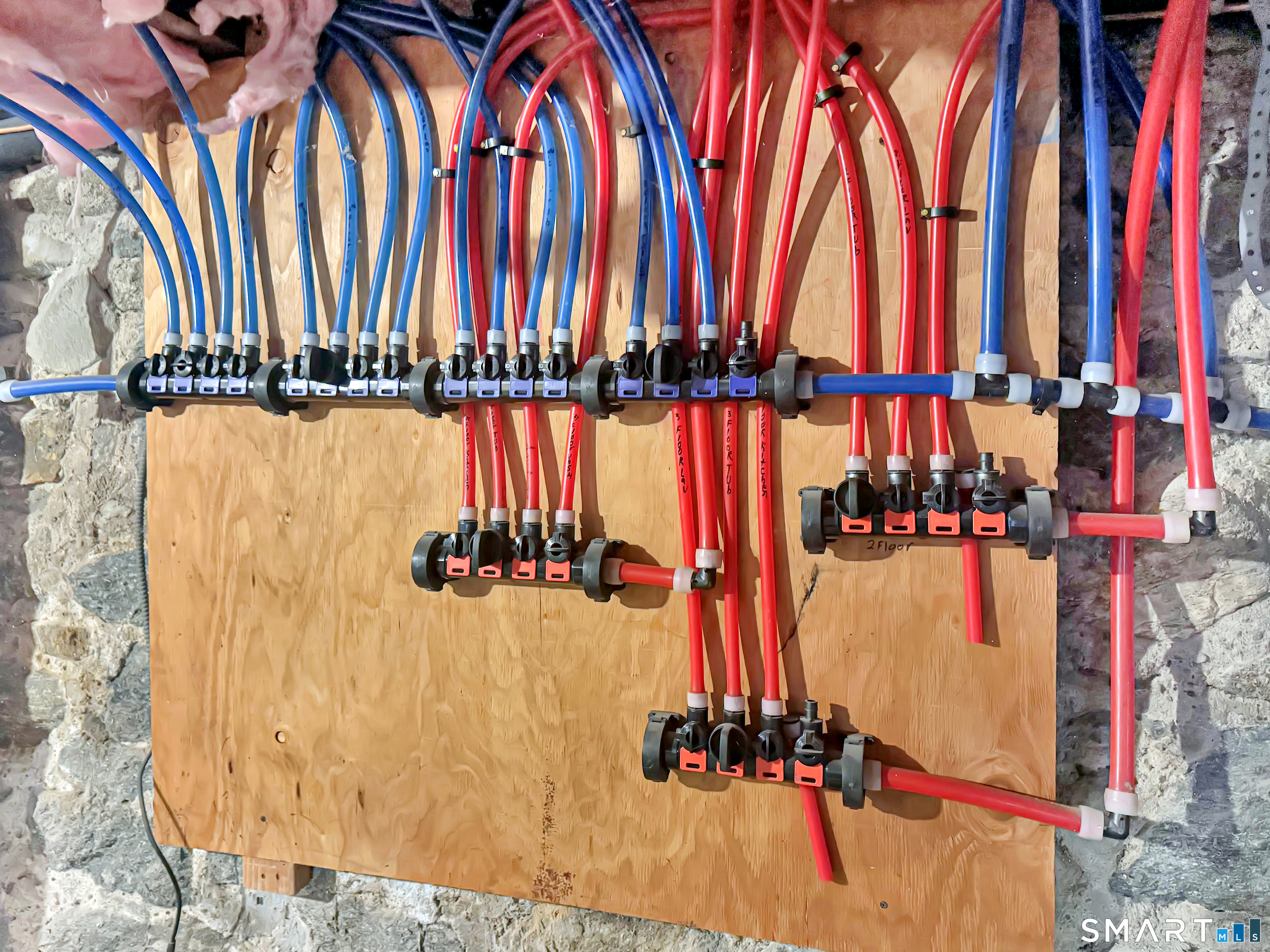 18 Columbia Street Ansonia, CT 06401 - Photo 14 of 16 a view of walk in closet with clothes and shoes