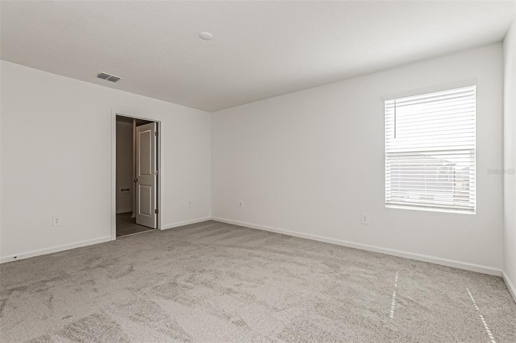 3526 Kimbrough Drive Lake Wales, FL 33853 - Photo 13 of 14 an empty room with a window
