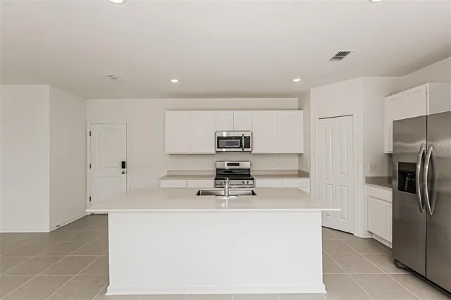 a counter top space with stainless steel appliances