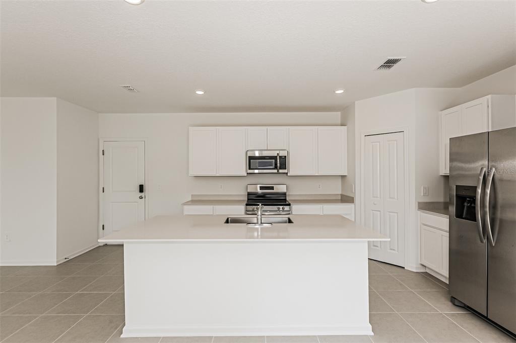 3526 Kimbrough Drive Lake Wales, FL 33853 - Photo 9 of 14 a counter top space with stainless steel appliances