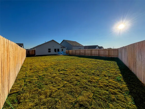 a bathroom with a sink toilet and mirror