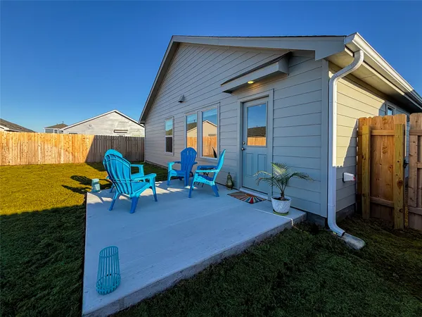 a view of a house with a big yard