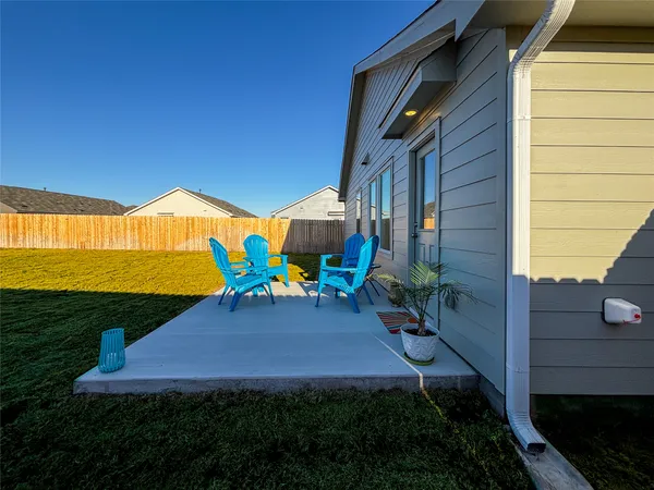 a large yard with lots of green space