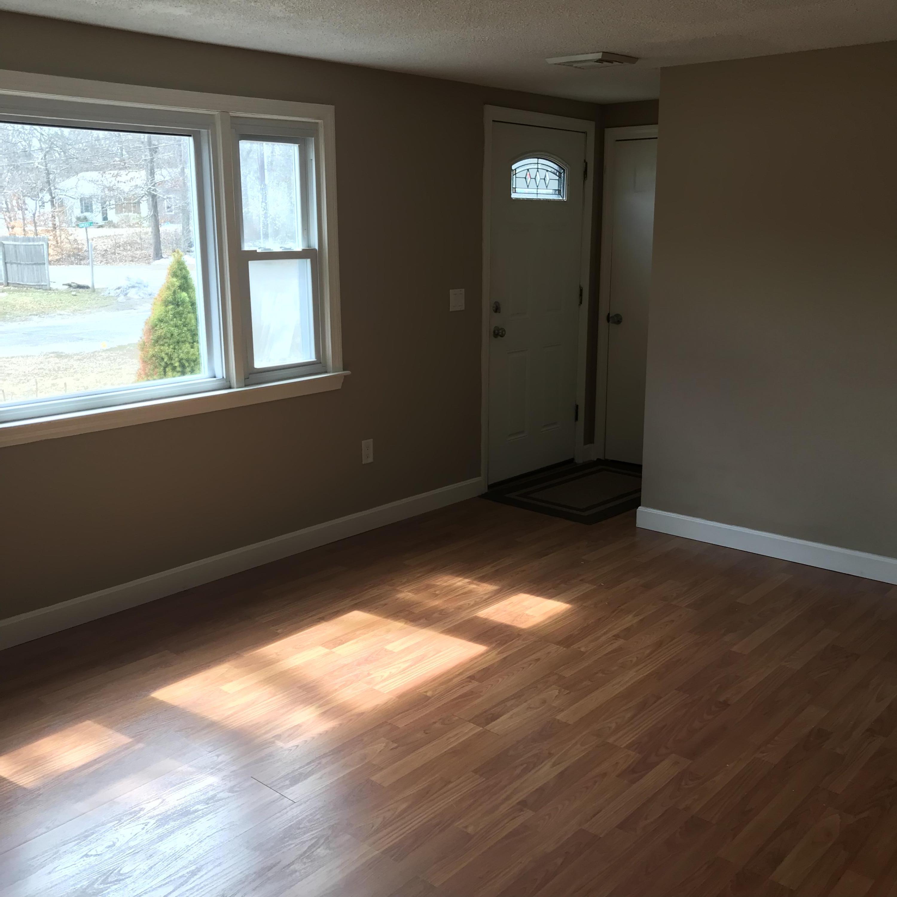 36 Somerset Road Mashpee, MA 02649 - Photo 11 of 17 a view of an empty room with wooden floor and a window