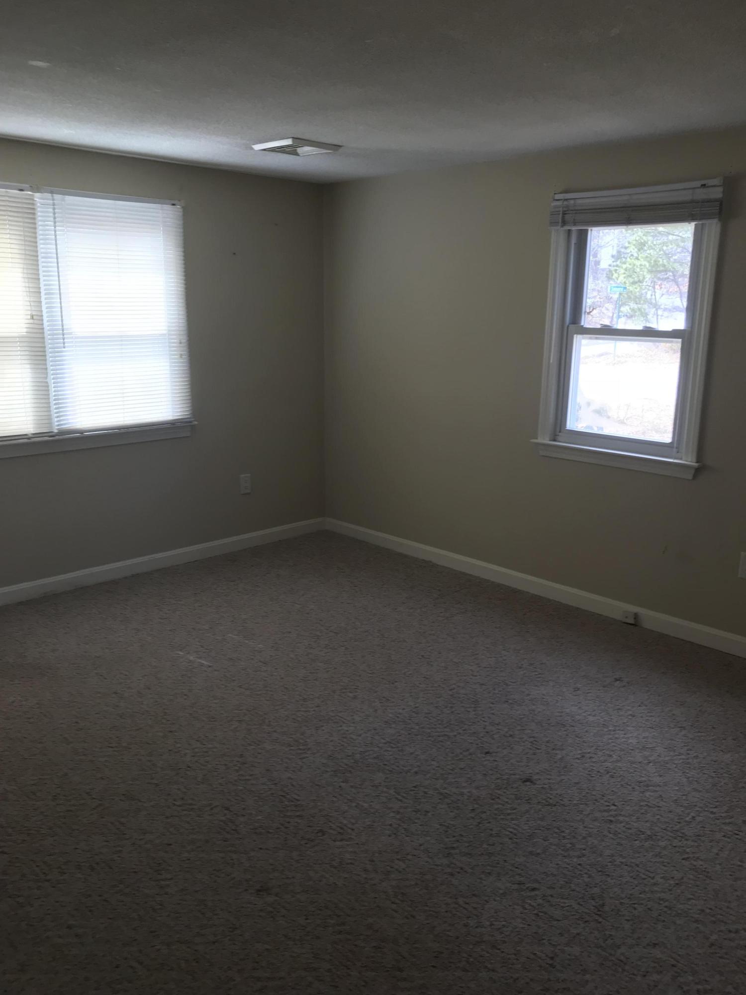 36 Somerset Road Mashpee, MA 02649 - Photo 17 of 17 an empty room with a window