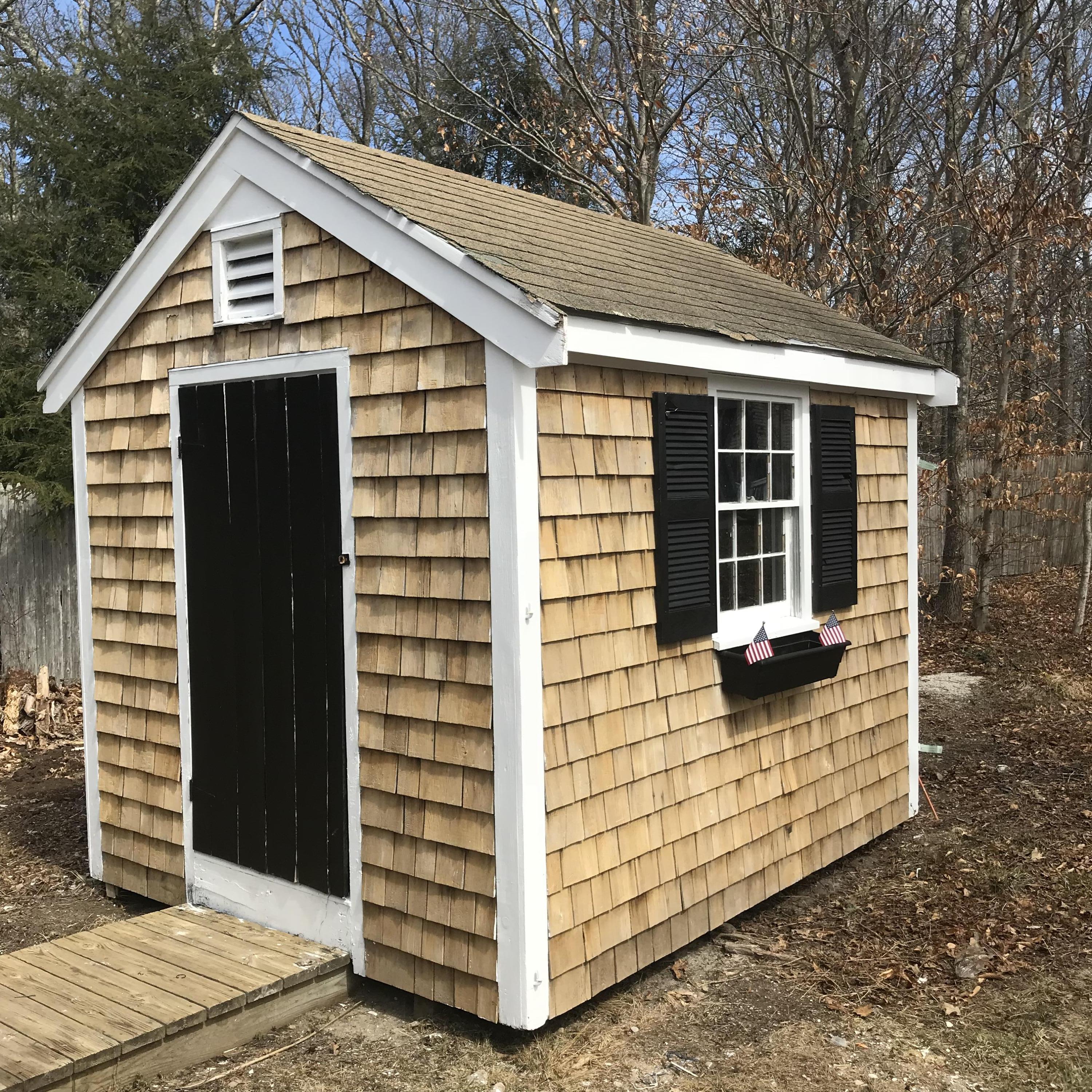 36 Somerset Road Mashpee, MA 02649 - Photo 5 of 17 a front view of a house with a yard