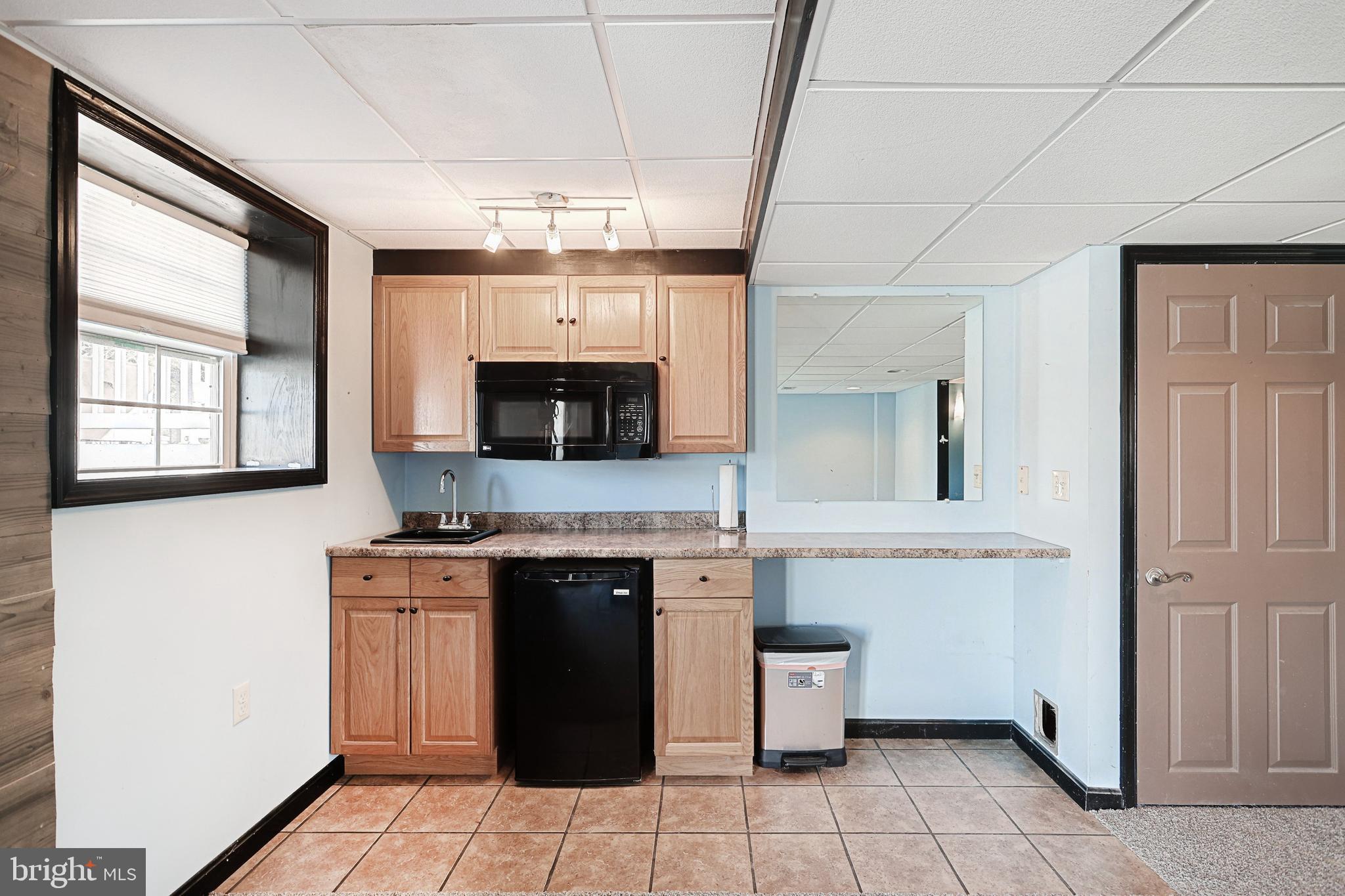 35 Apache Pass Hanover, PA 17331 - Photo 27 of 34 Lower Level Family Room, wet bar, bath rough in