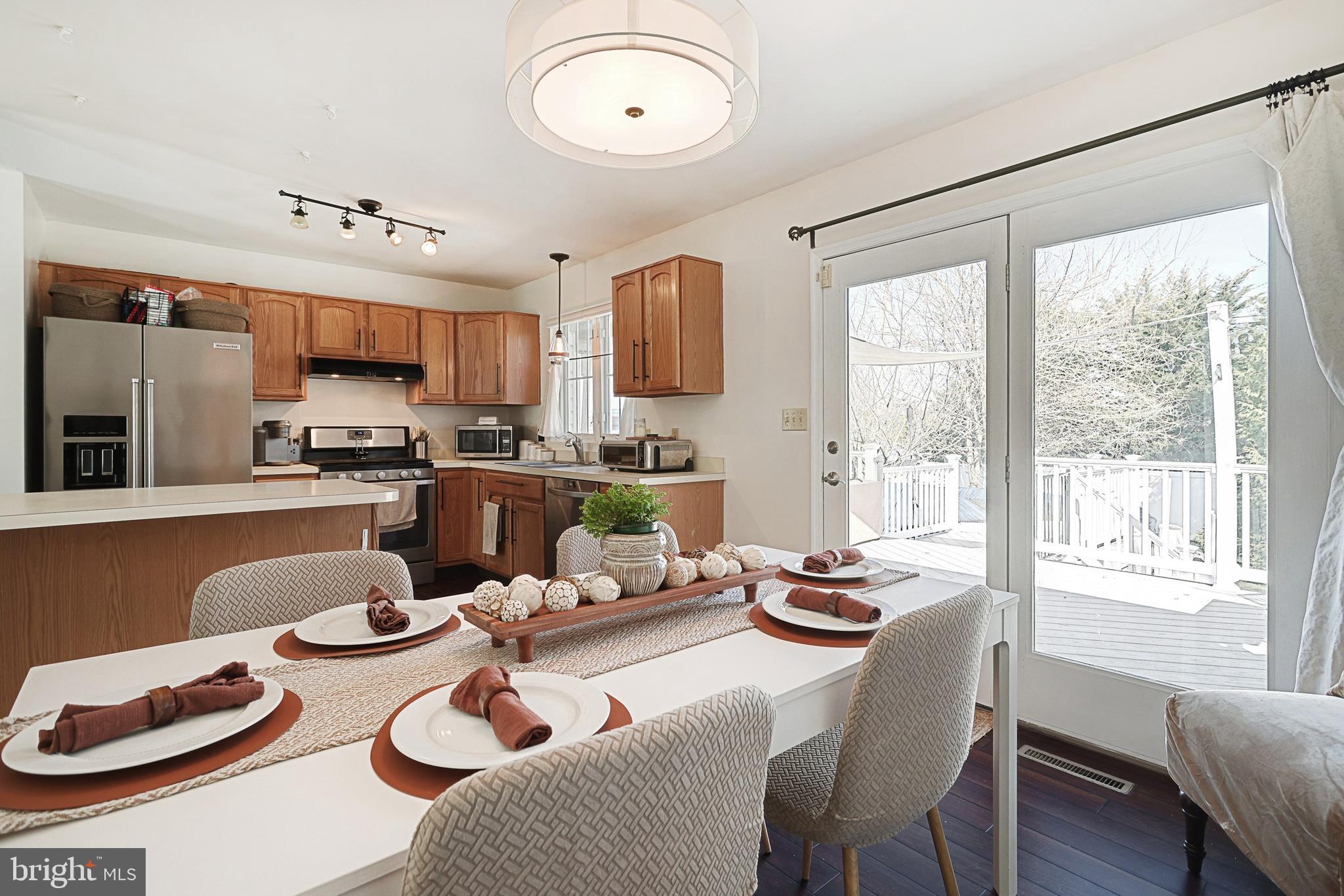 35 Apache Pass Hanover, PA 17331 - Photo 8 of 34 Eat-in kitchen with door to deck