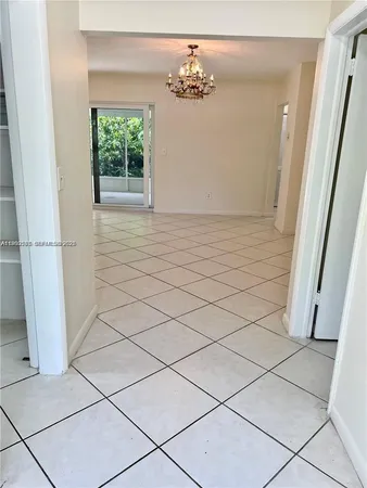 a view of a utility room with windows