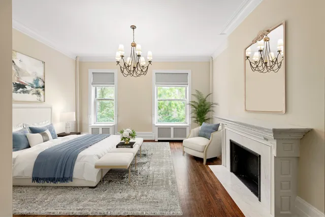a dining room with furniture and a potted plant