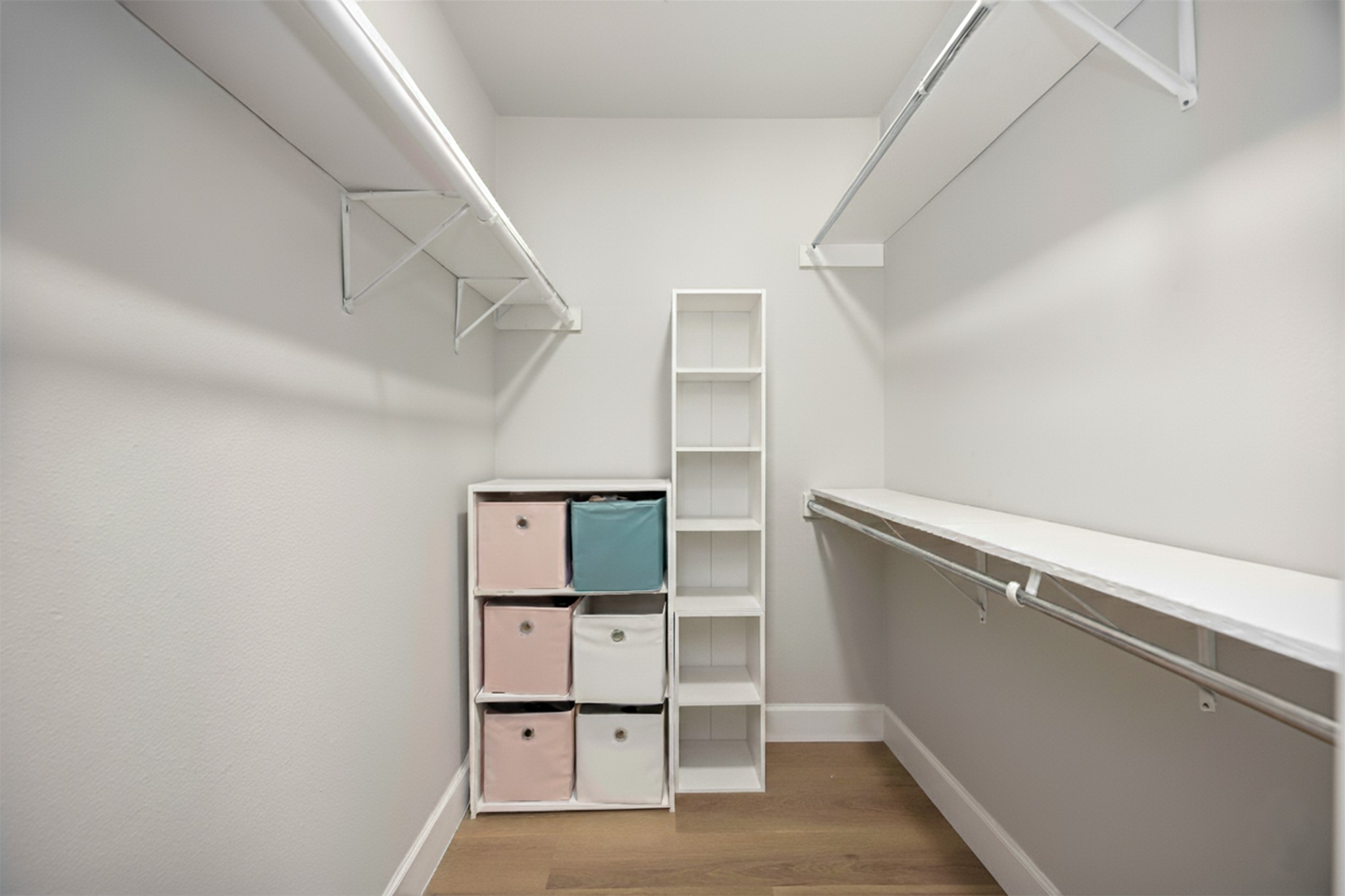 12119 Spring Grove Drive Houston, TX 77099 - Photo 18 of 30 a view of walk in closet with empty racks