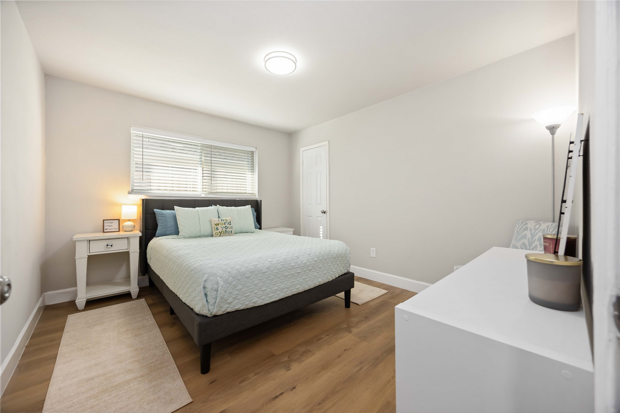 12119 Spring Grove Drive Houston, TX 77099 - Photo 19 of 30 a bedroom with a bed and a couch