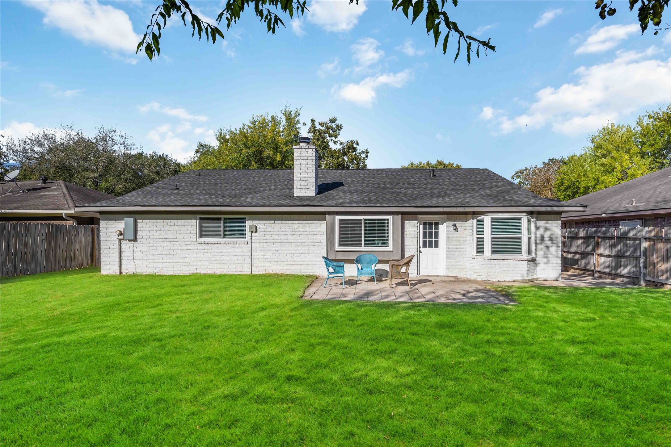 12119 Spring Grove Drive Houston, TX 77099 - Photo 27 of 30 a front view of house with yard and seating area