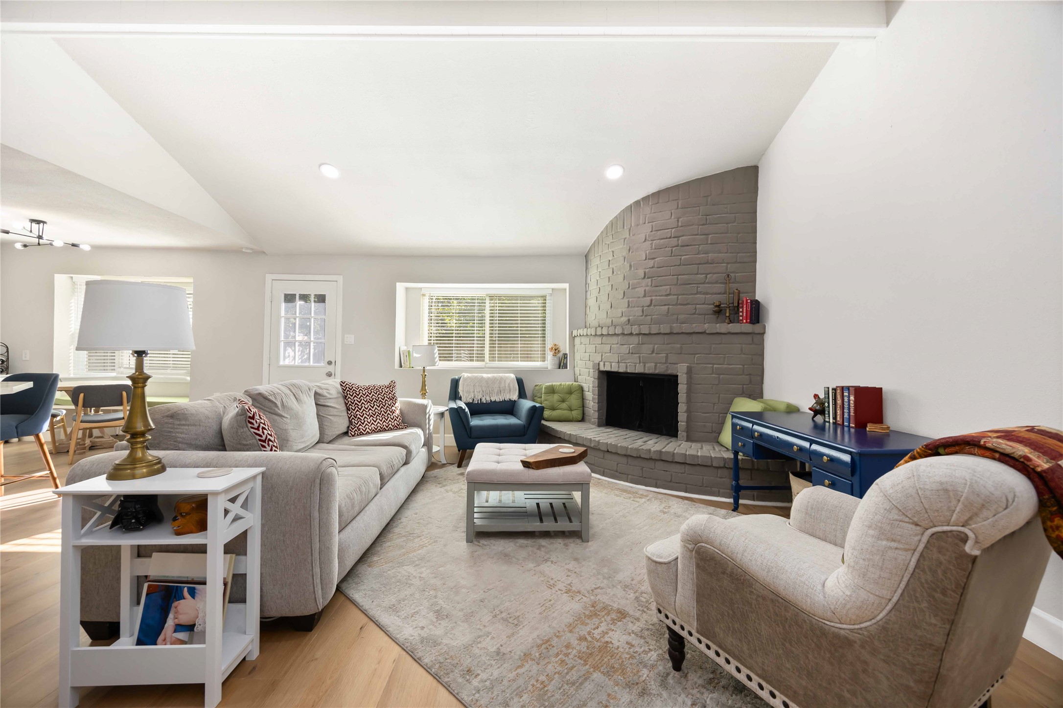12119 Spring Grove Drive Houston, TX 77099 - Photo 6 of 30 a living room with furniture fireplace and a flat screen tv