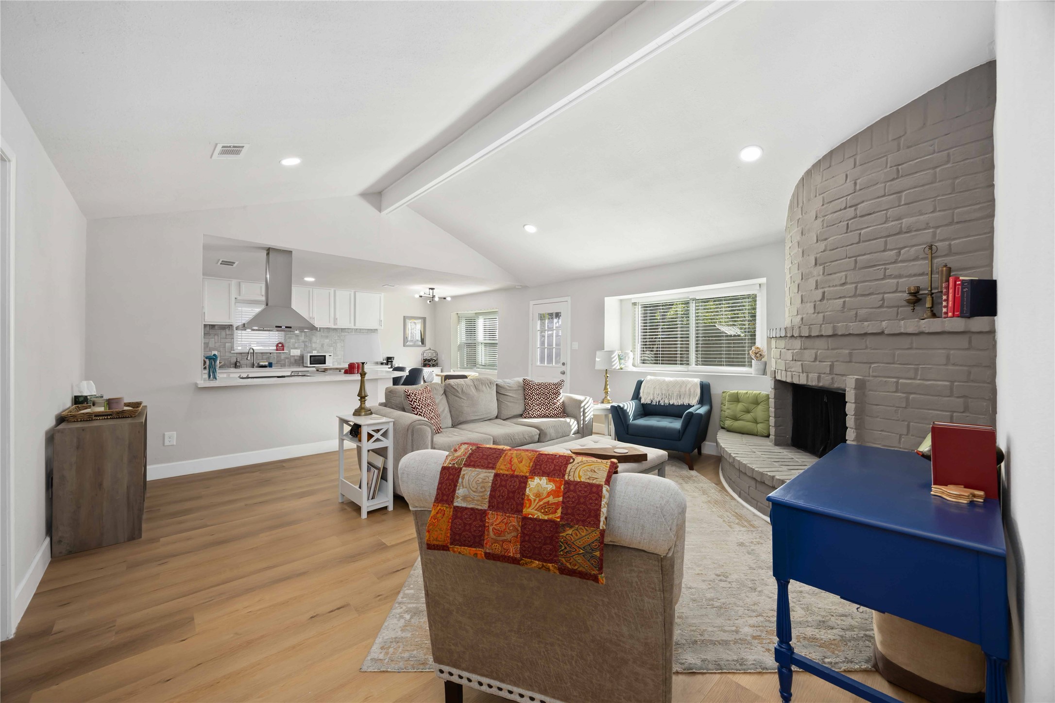 12119 Spring Grove Drive Houston, TX 77099 - Photo 9 of 30 a living room with fireplace furniture and a wooden floor