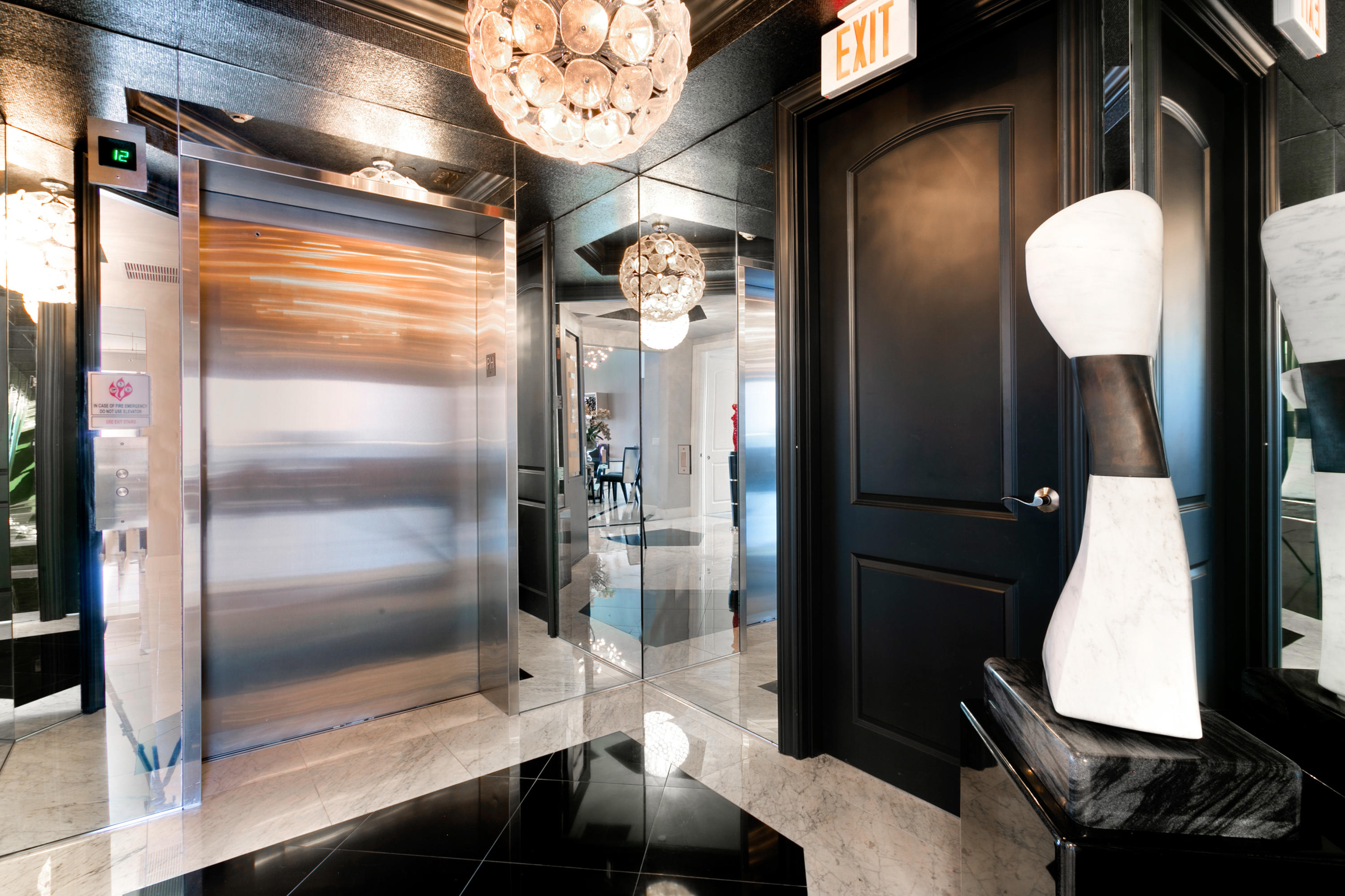 4600 North Ocean Drive, Unit 1901 Riviera Beach, FL 33404 - Photo 14 of 73 Elevator foyer
