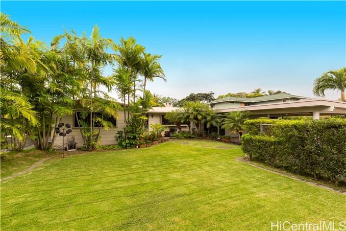 Secluded, grassy front yard is fully fenced for kids and pets!  Automatic sprinklers too!