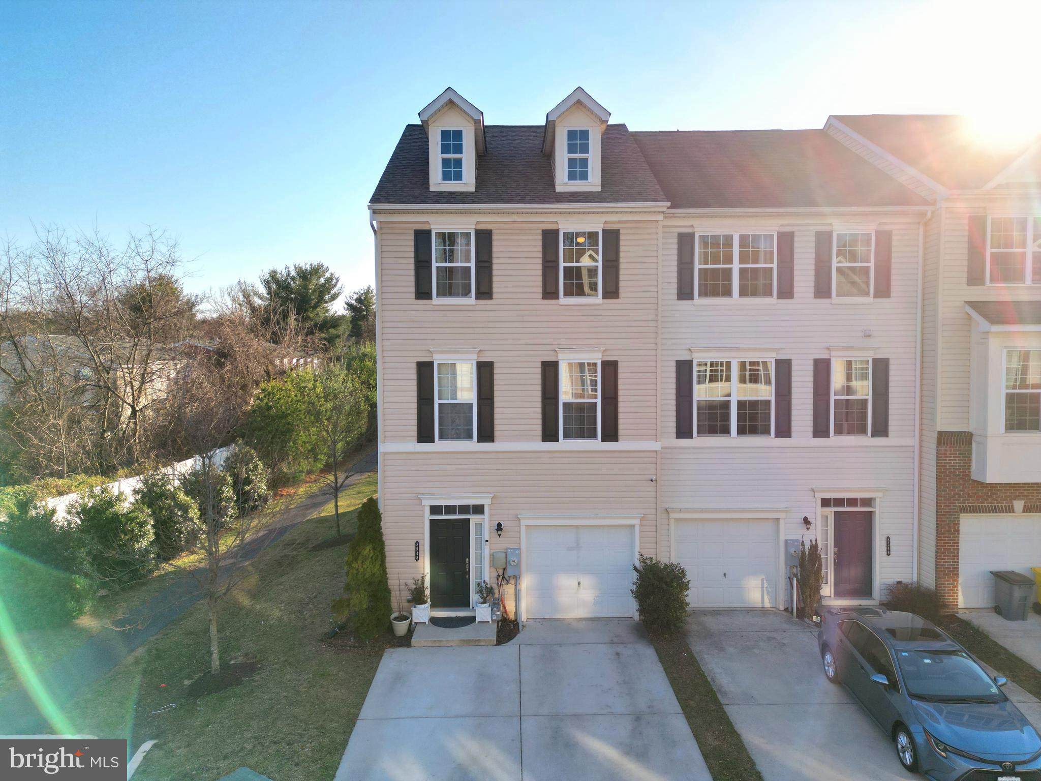 8548 Golden Eagle Lane Severn, MD 21144 - Photo 1 of 76 a view of a brick house with many windows