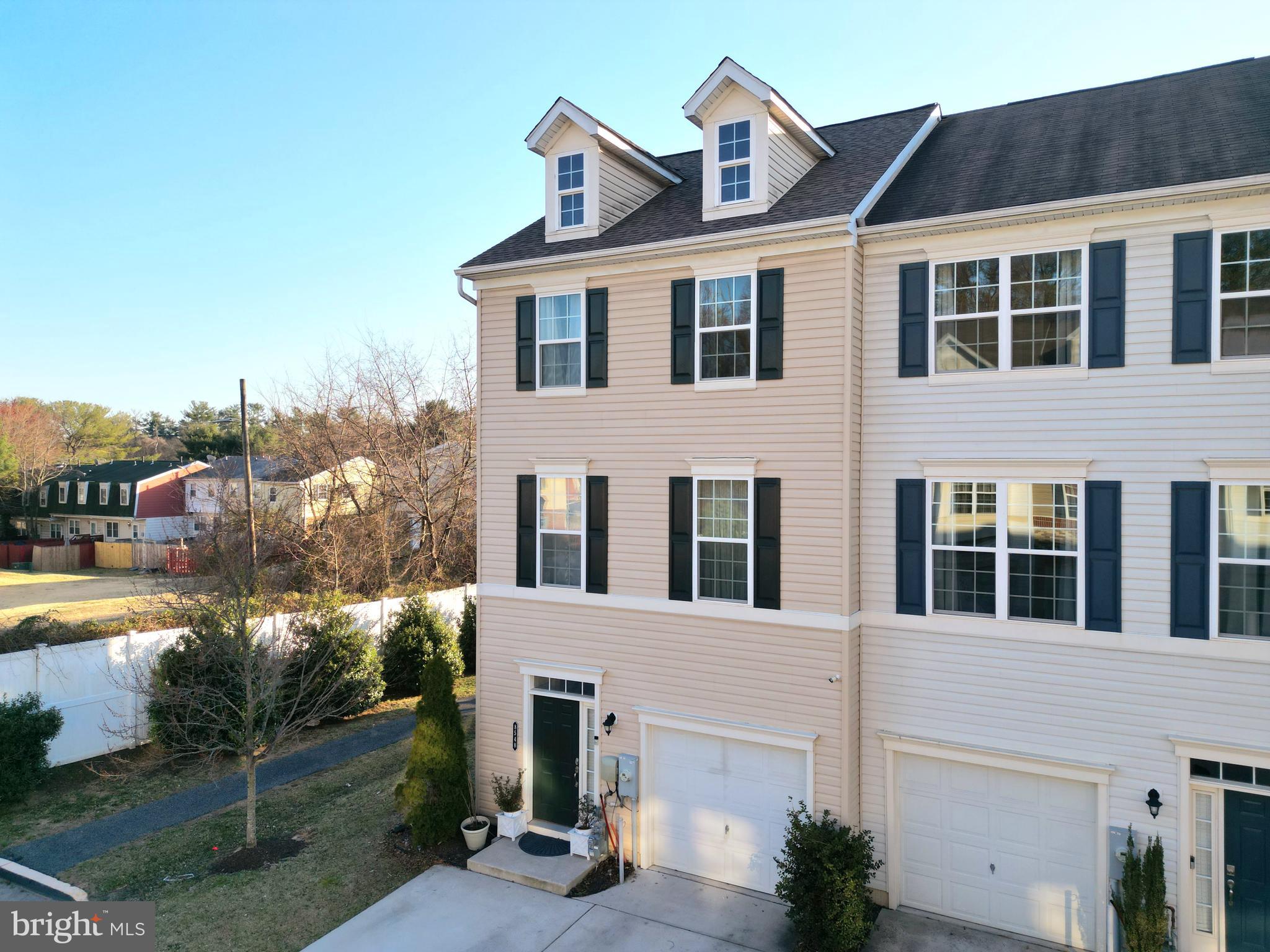 8548 Golden Eagle Lane Severn, MD 21144 - Photo 2 of 76 a front view of a house with a yard