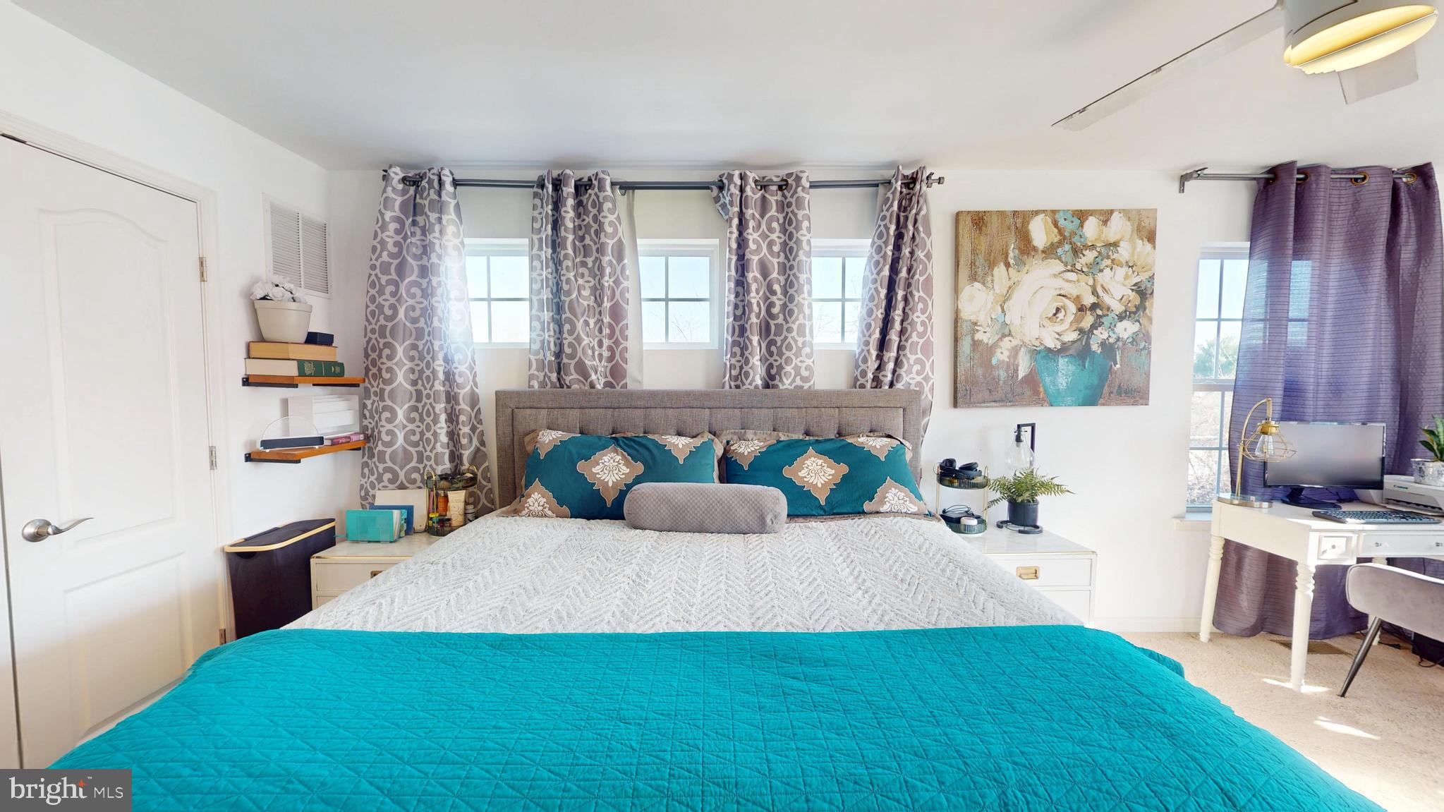 8548 Golden Eagle Lane Severn, MD 21144 - Photo 38 of 76 a bedroom with a bed furniture and a window