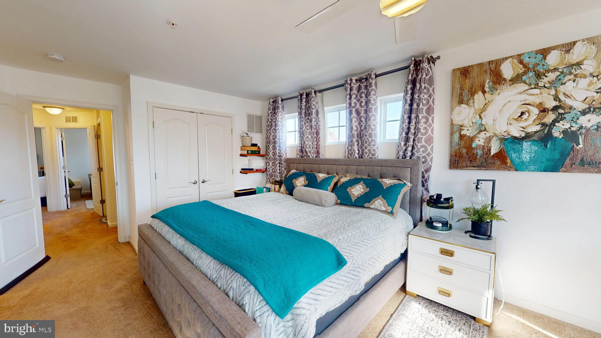 8548 Golden Eagle Lane Severn, MD 21144 - Photo 39 of 76 a bedroom with a bed and a window