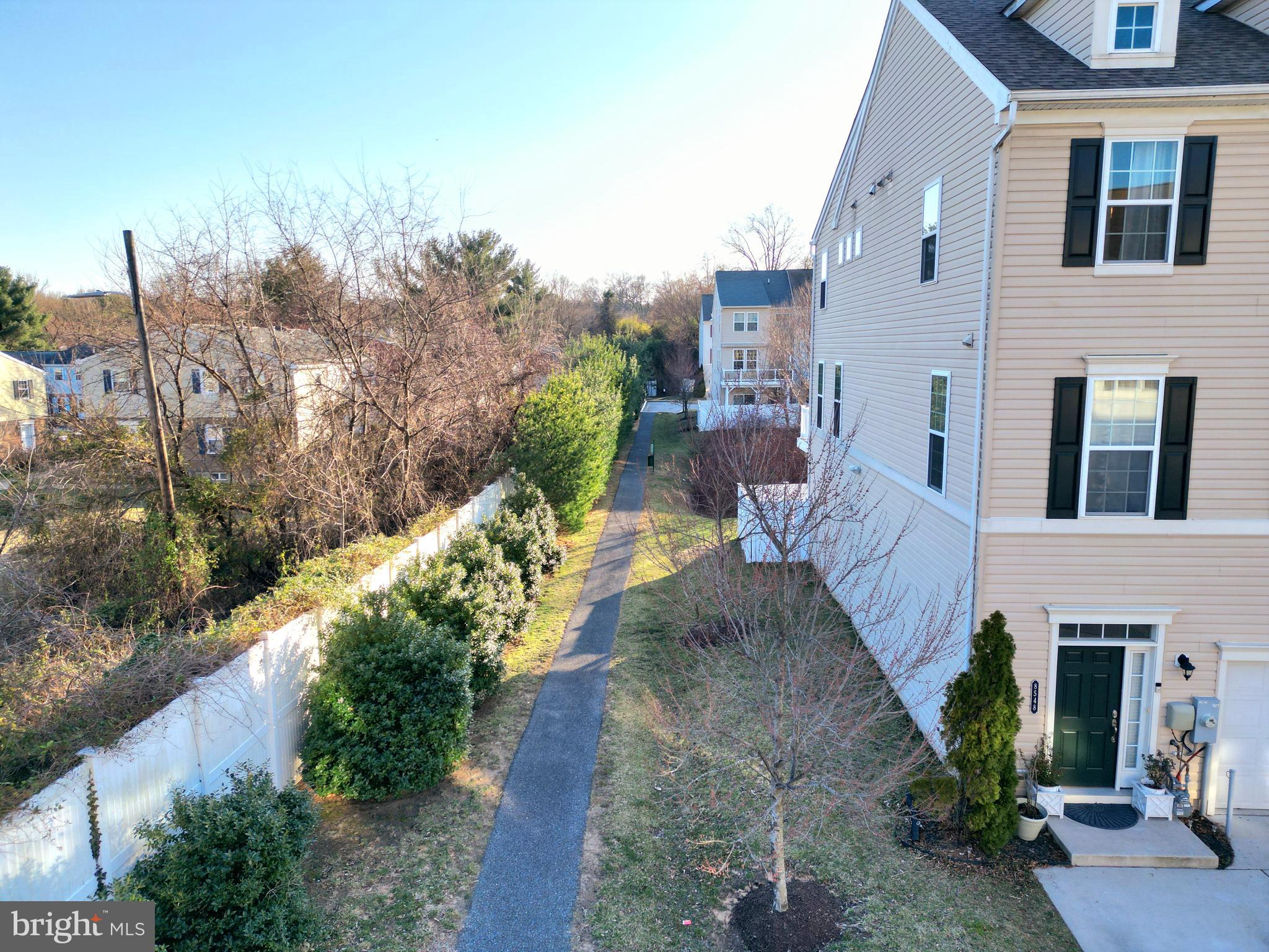 8548 Golden Eagle Lane Severn, MD 21144 - Photo 4 of 76 a view of a house with backyard and sitting area