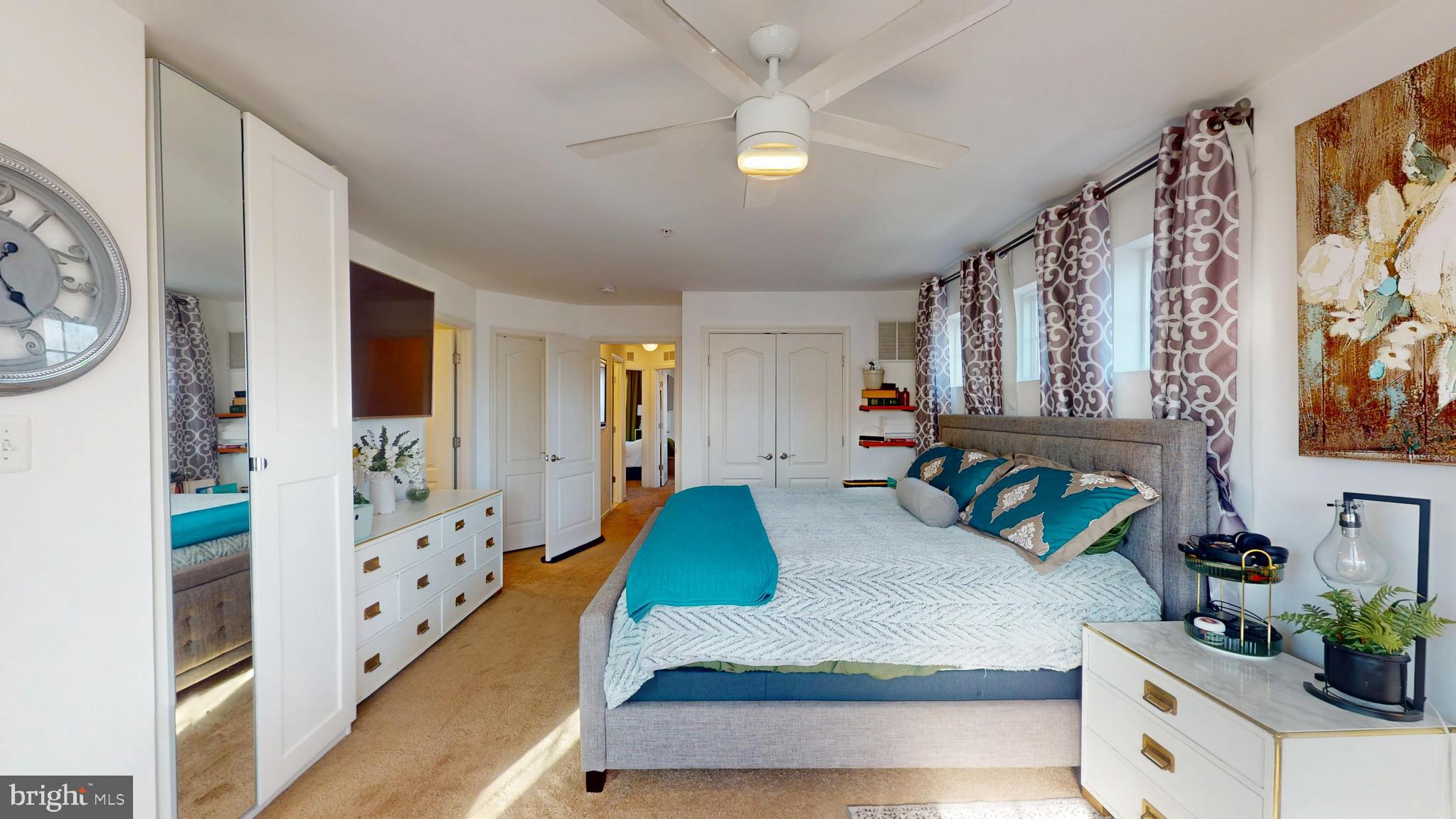 8548 Golden Eagle Lane Severn, MD 21144 - Photo 41 of 76 a living room with furniture and a chandelier
