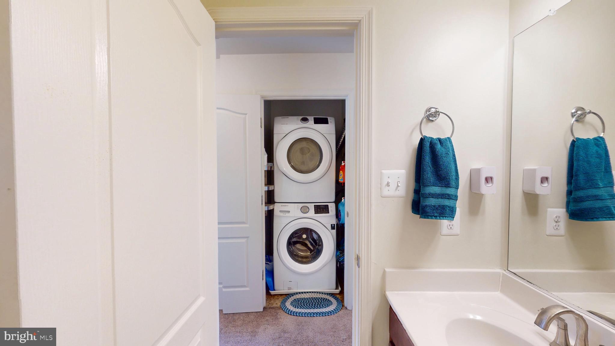 8548 Golden Eagle Lane Severn, MD 21144 - Photo 50 of 76 a bathroom with a sink and a washing machine