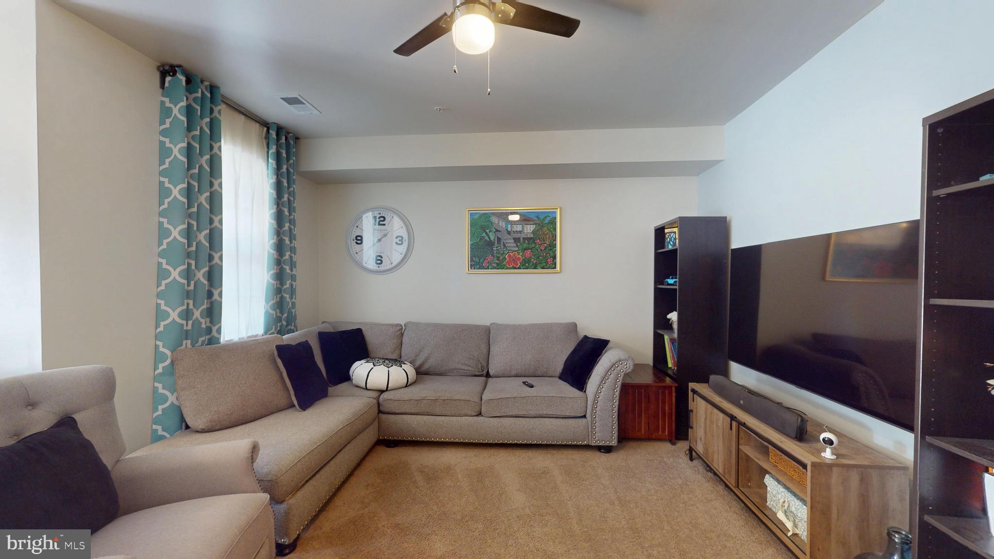 8548 Golden Eagle Lane Severn, MD 21144 - Photo 58 of 76 a living room with furniture