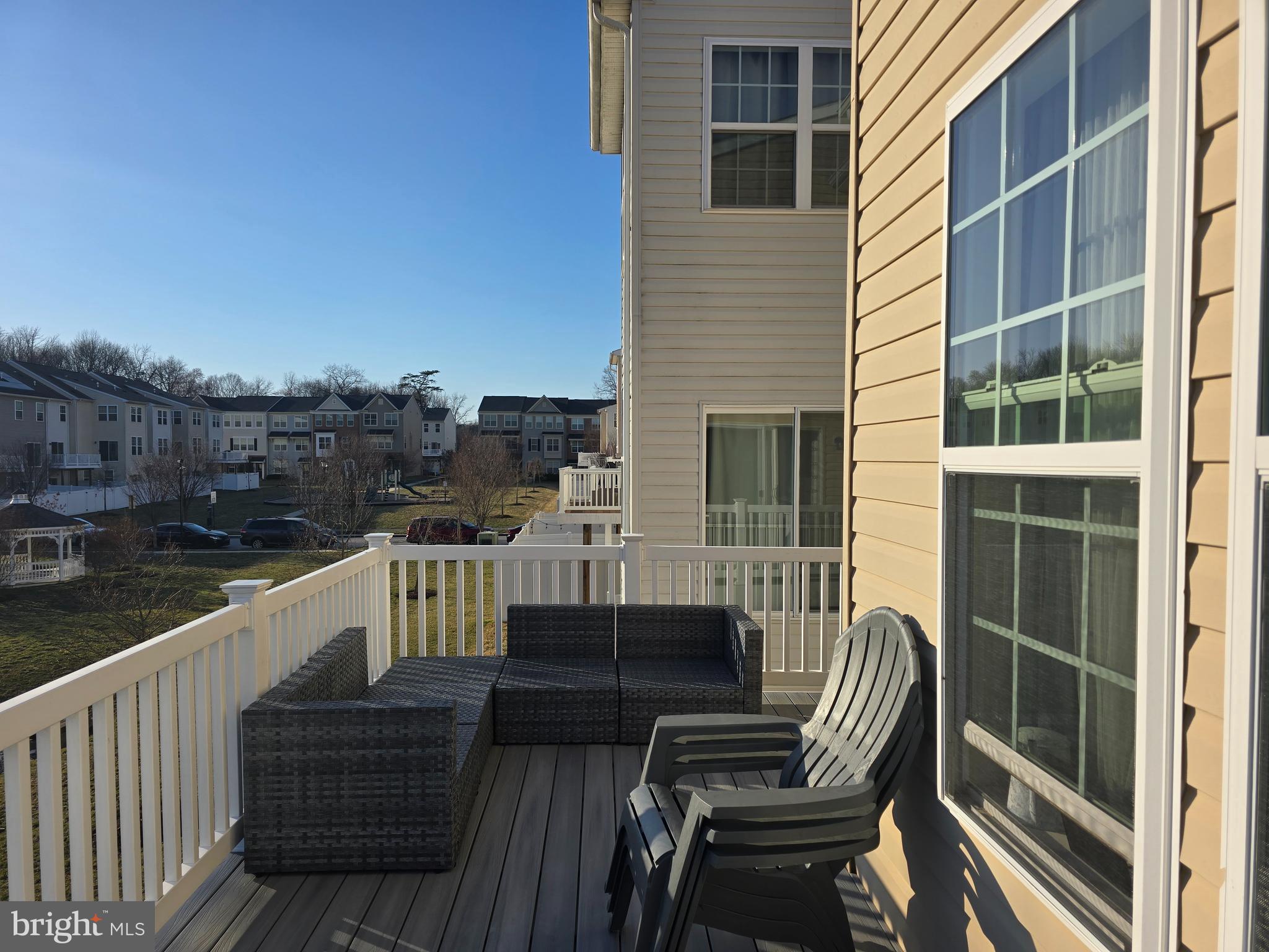 8548 Golden Eagle Lane Severn, MD 21144 - Photo 67 of 76 a view of a balcony with chairs