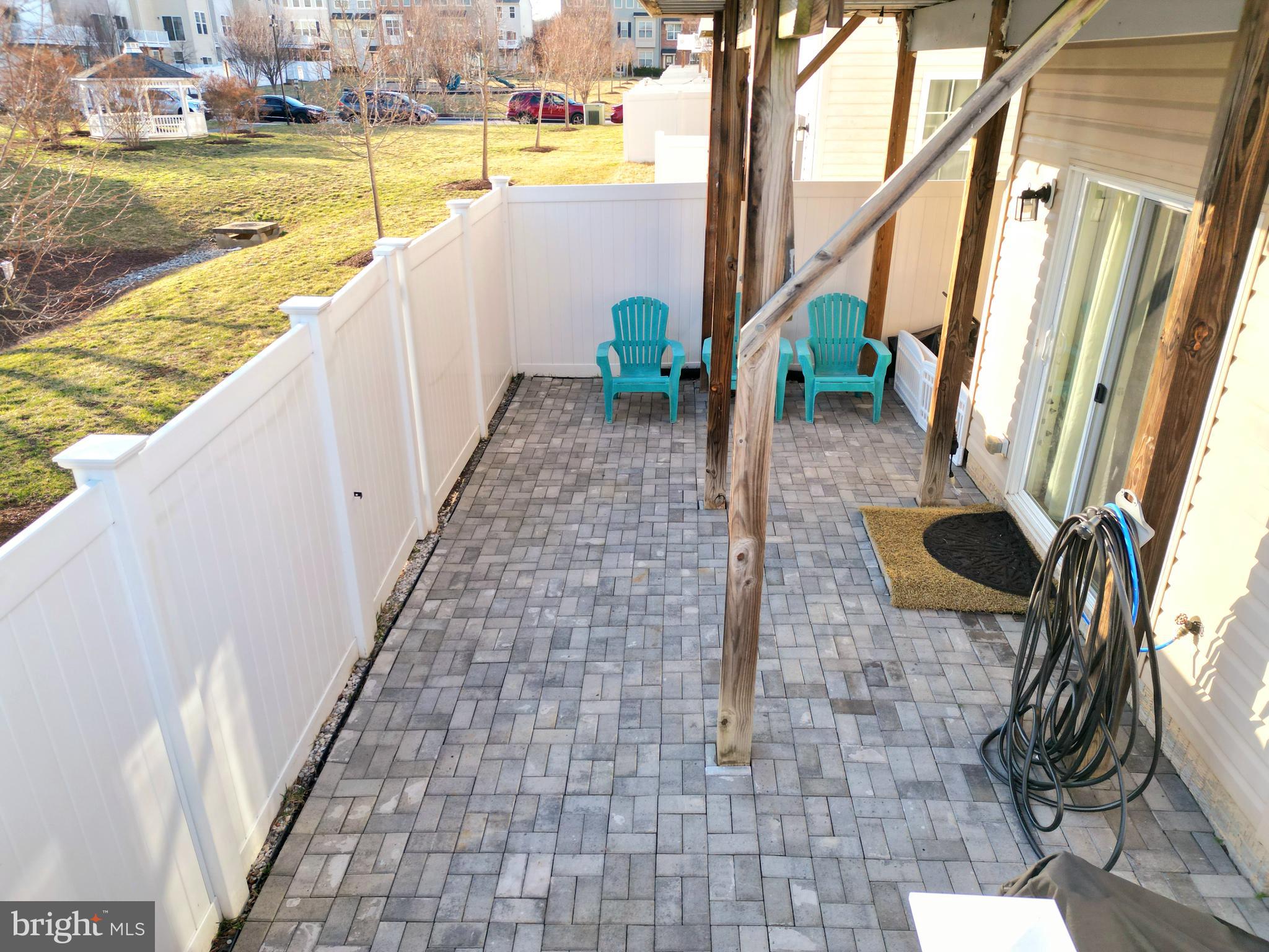 8548 Golden Eagle Lane Severn, MD 21144 - Photo 69 of 76 a view of swimming pool with an outdoor seating