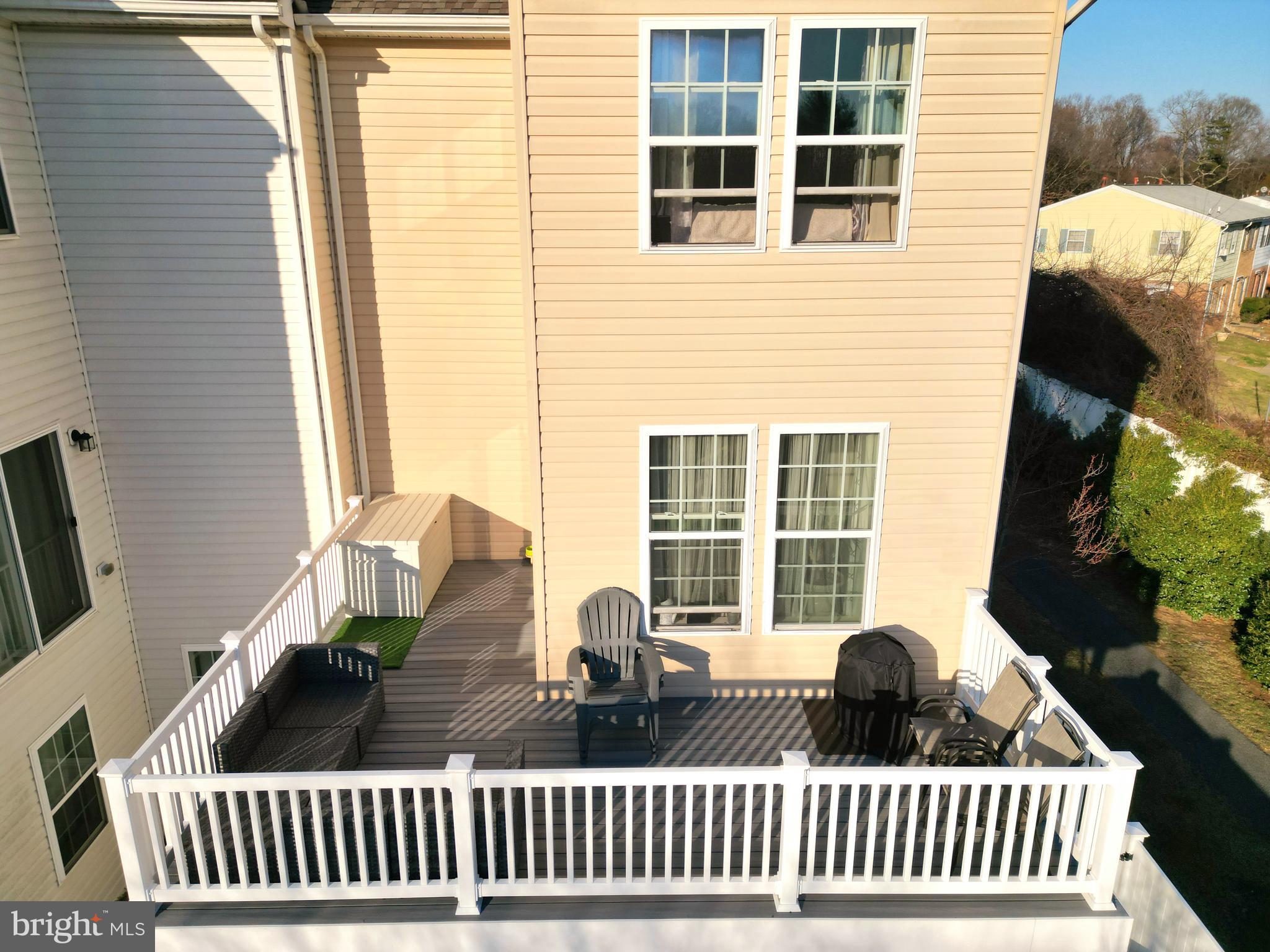 8548 Golden Eagle Lane Severn, MD 21144 - Photo 72 of 76 a front view of a house with a garden