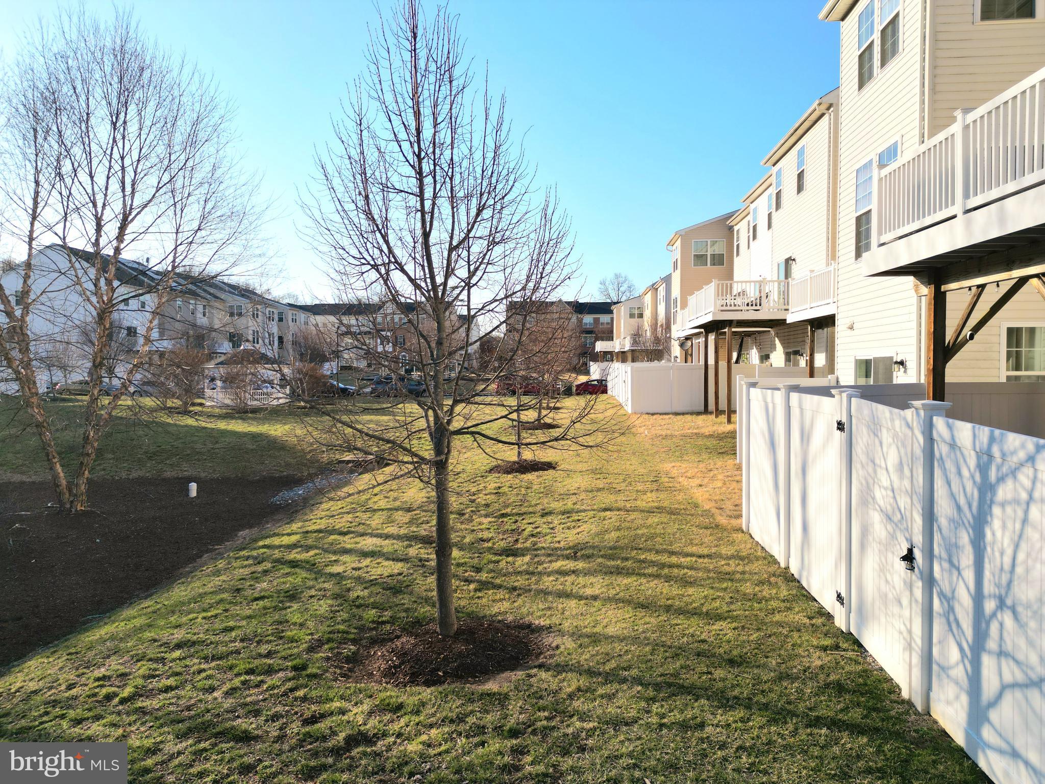 8548 Golden Eagle Lane Severn, MD 21144 - Photo 73 of 76 a view of a swimming pool with a yard