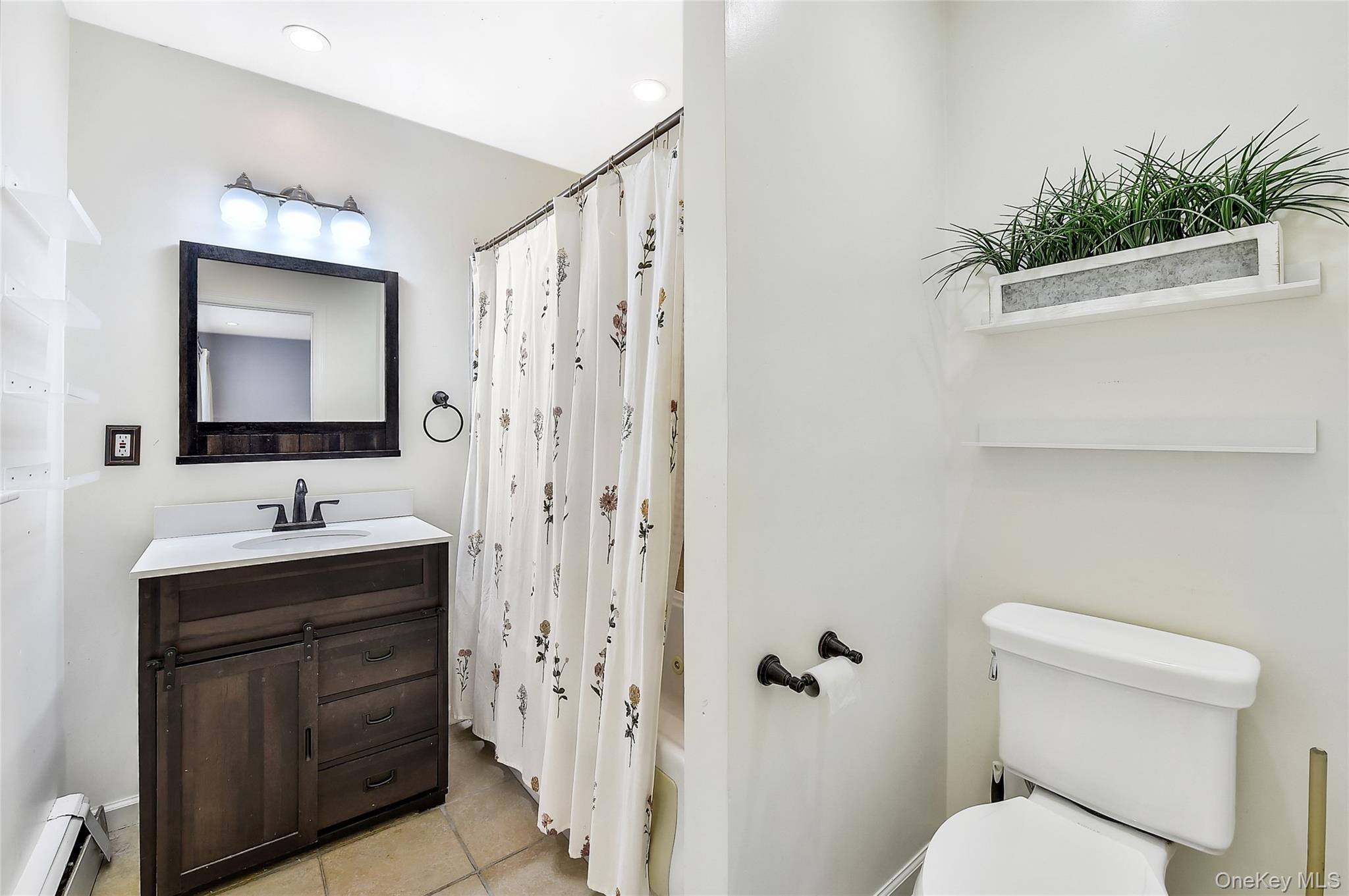 18 Stage Road Pine Island, NY 10969 - Photo 9 of 17 a bathroom with a toilet sink and mirror