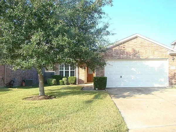 a view of a backyard with small cabin